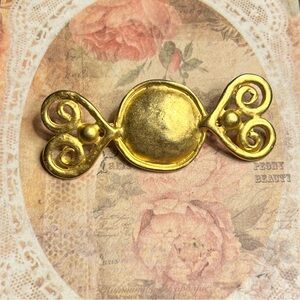 Gold Brooch with Swirl Heart Design